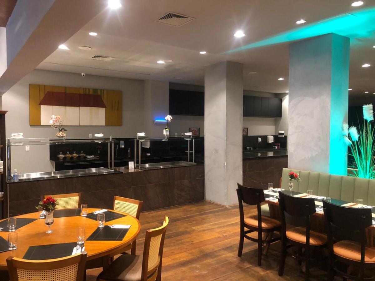 Apart-Hotel De Luxo Em Lourdes เบโลโอรีซอนชี ภายนอก รูปภาพ