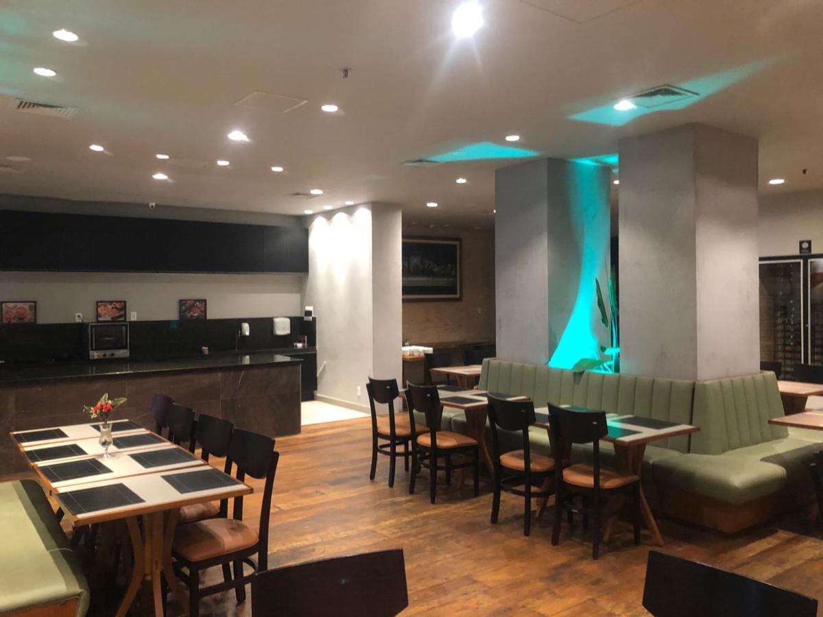 Apart-Hotel De Luxo Em Lourdes เบโลโอรีซอนชี ภายนอก รูปภาพ